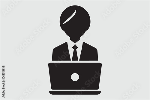 Silhouette of a person sitting behind a laptop.