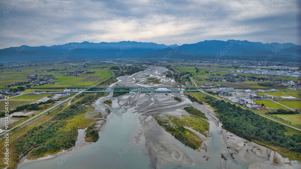 Fototapeta premium The area near the mouth of the Kurobe River flowing through Toyama Prefecture, Japan
