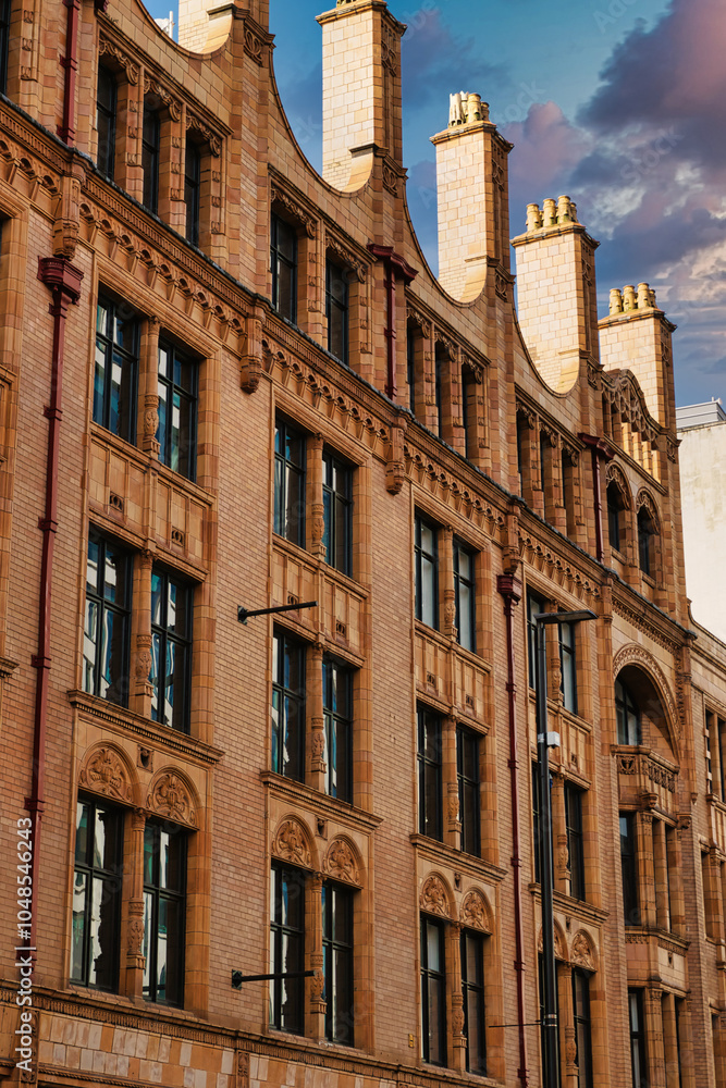 Brick Building with Ornate Detailing and Chimneys Brick Building with Ornate Detailing and Chimneys
