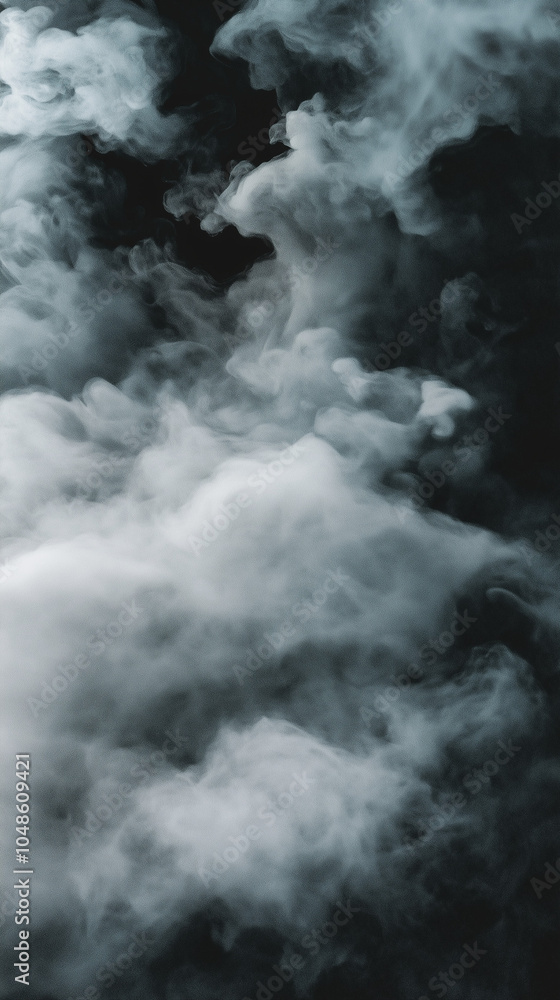 Fototapeta premium Close-up of steam or abstract white smog rising above. water droplets that can be seen that swirl beautifully from humidifier spray. Isolated on a black background