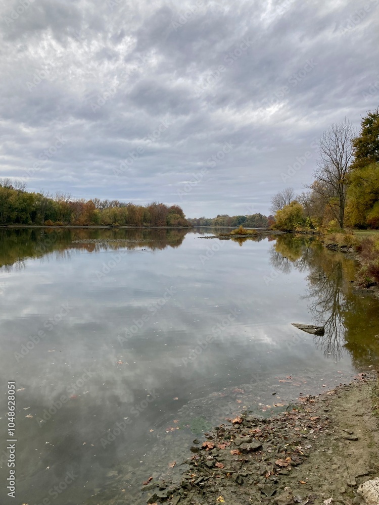 Fototapeta premium river and clouds in autumn
