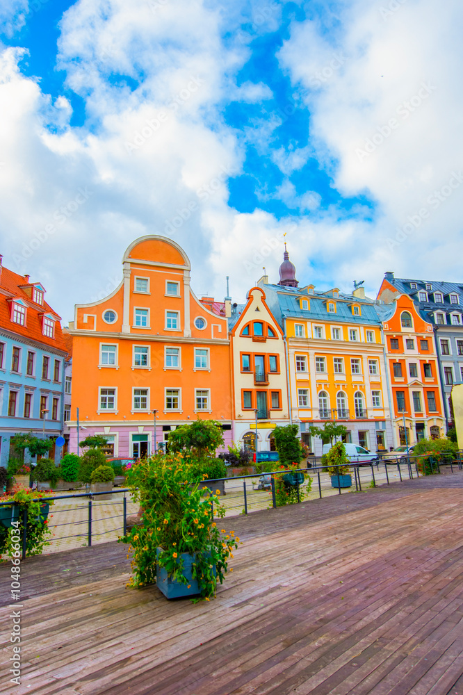 Naklejka premium Old street in old Riga. The city is capital of Latvia that is well known to be a very popular tourism destination in the Baltic region