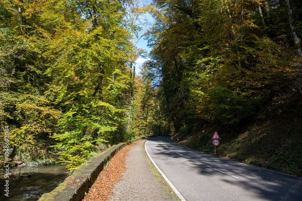 Obraz premium Scenic diversity of Mullerthal, Luxembourg's Little Switzerland, Schiessentumpel Cascade hiking routes, rock formations, forests, tourist destination in Europe