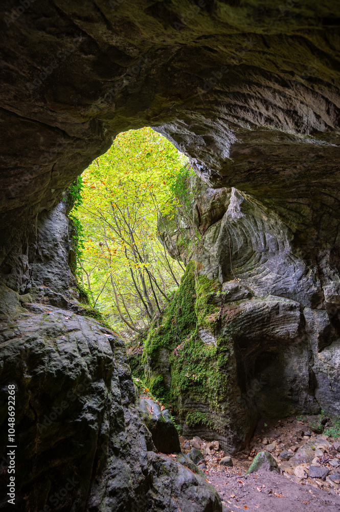 Obraz premium Scenic diversity of Mullerthal, Luxembourg's Little Switzerland, hiking routes, rock formations, moss-covered forests, tourist destination in Europe