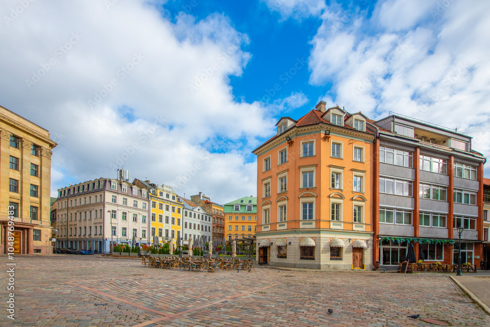 Obraz premium Old street in old Riga. The city is capital of Latvia that is well known to be a very popular tourism destination in the Baltic region