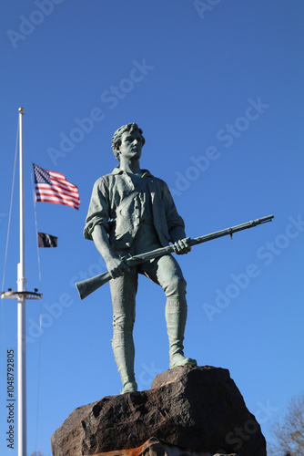 The minuteman statue stands proud over Lexington battlefield green, October 2024