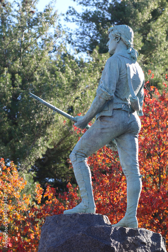 The minuteman statue stands proud over Lexington battlefield green, October 2024 photo