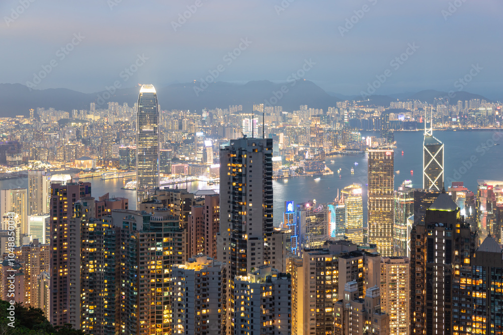 HONG KONG - MAY 5, 2024: Hong Kong city night view from Victoria Peak HONG KONG - MAY 5, 2024: Hong Kong city night view from Victoria Peak