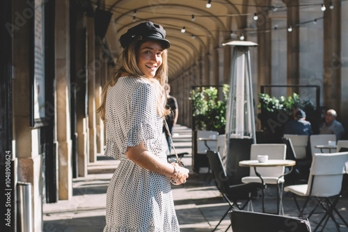 Canvastavla Full length portrait of positive hipster girl dressed in stylish sundress posing