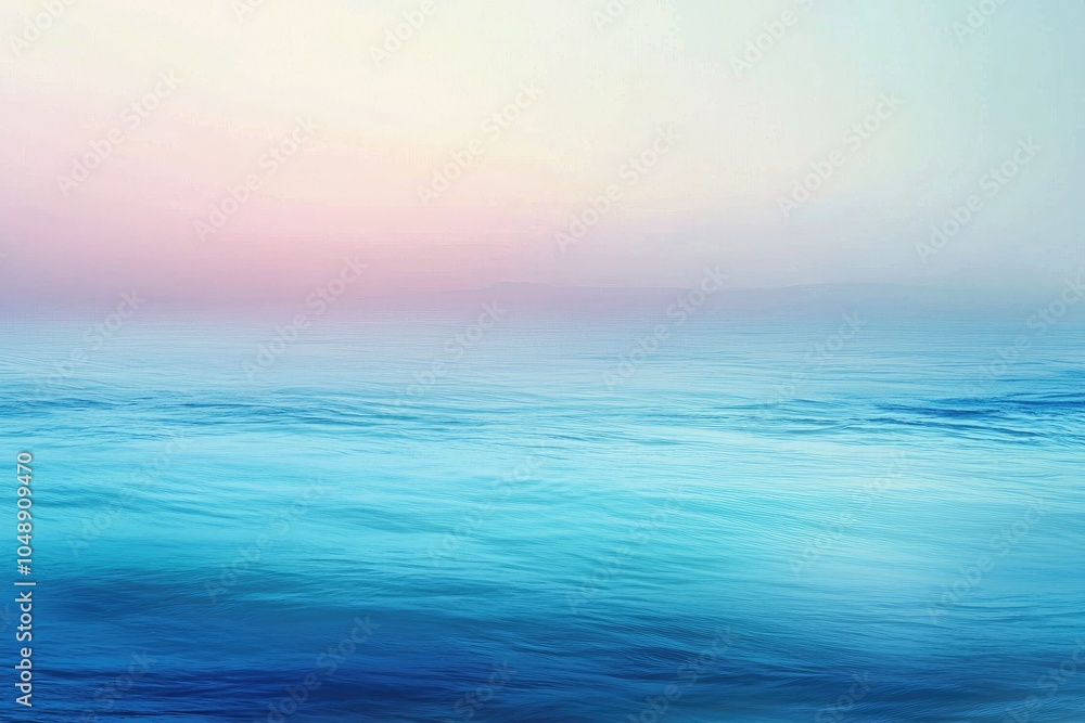 Obraz premium Calm Ocean Water with a Pink and Blue Gradient Sky
