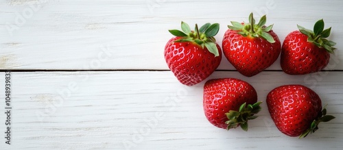 Four ripe juicy strawberrie...
