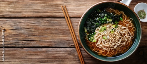 Japanese cuisine Soba noodles served with soup on a wooden table. with copy space image. Place for adding text or design photo