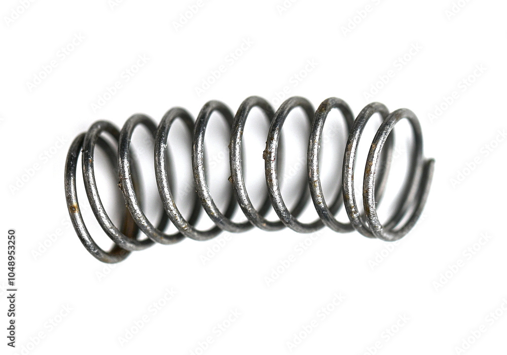 Close-up of used old metal spring on white background, top view Close-up of used old metal spring on white background, top view