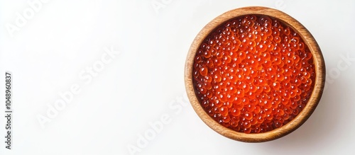 Wooden bowl filled with red...