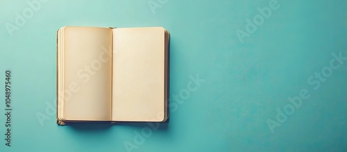 Empty notebook on blue back...