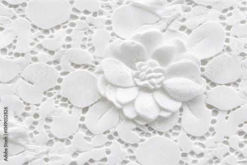 A white lacy fabric filled with fine grained fibers.