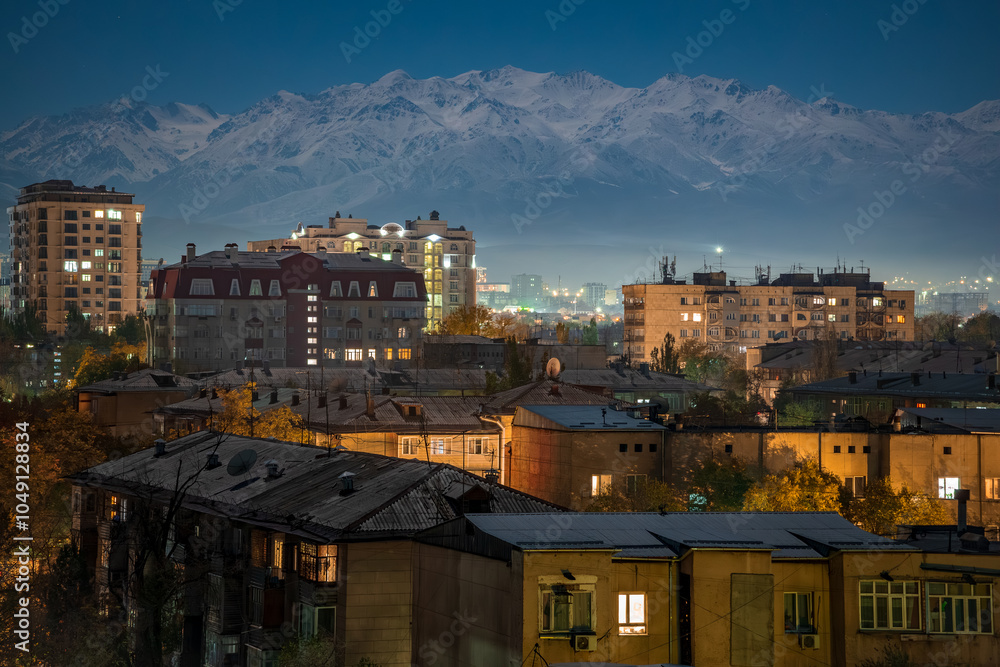Naklejka premium Bishkek city at night and mountains