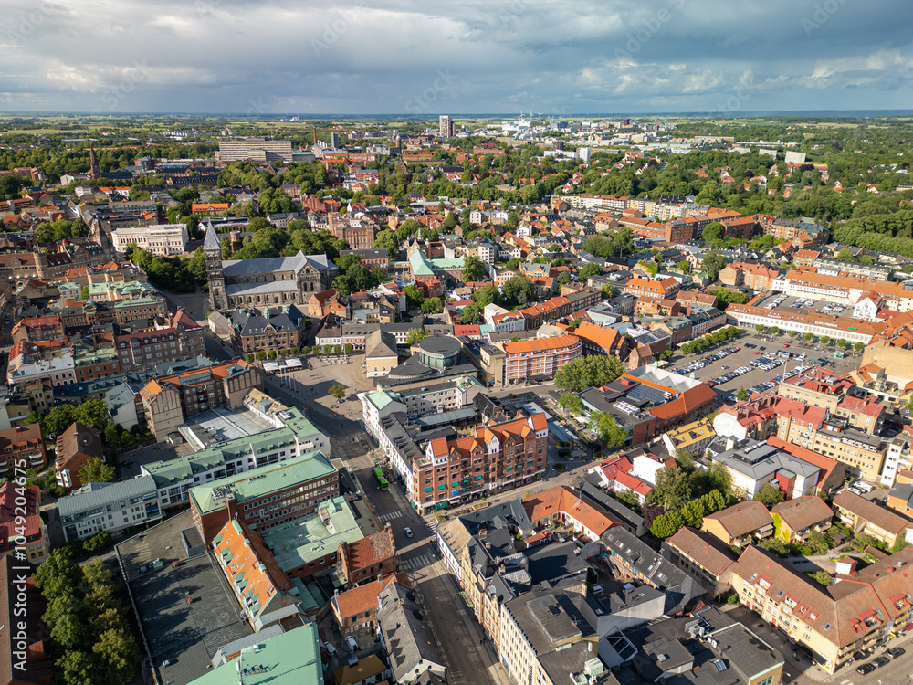 Obraz premium Lund, Sweden - 12 June 2024: Aerial view of Lund city centre with Lund Cathedral in the middle foreground