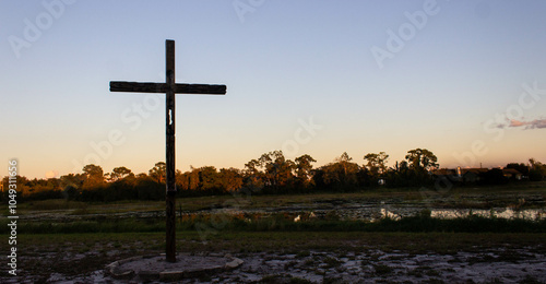 cross on the hill at sunset