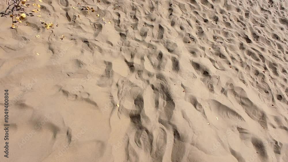 Walking along the footsteps in desert with hiking shoes, POV 4k real time footage. Walking along the footsteps in desert with hiking shoes, POV 4k real time footage.