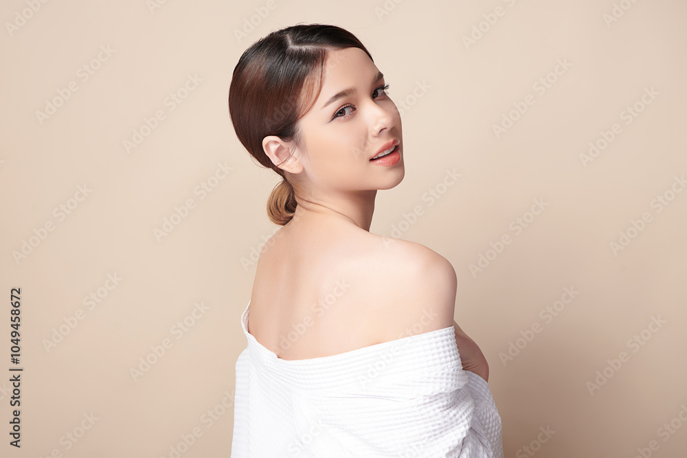 Beautiful young asian woman back view with clean fresh skin on beige background, Face care, Facial treatment, Cosmetology, beauty and spa, Asian women portrait.
