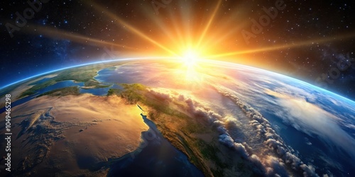 A celestial sunrise illuminates the Earth, casting a warm glow across continents and oceans, while a tapestry of clouds stretches across the horizon.