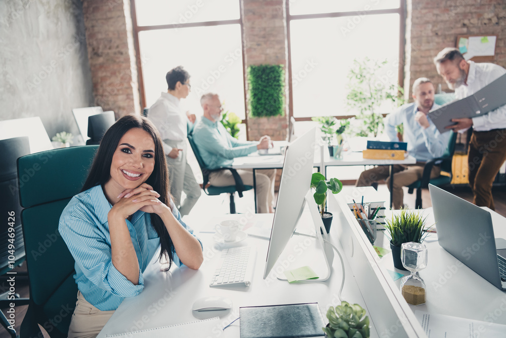 Obraz premium Photo of teamwork people working together young female employee smile comfortable modern office loft room interior indoors workspace