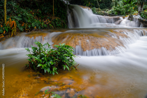 beautiful waterfall in the forest in tuyen quang, vietnam photo