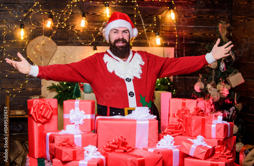 Christmas just got cheesier. Holidays filled with fun. Man wear Santa costume. Give big cheer for New Year. Bearded emotional Santa Claus. Cheerful Santa with gifts. Decorate your christmas with joy photo