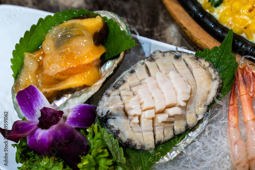 sashimis of abalone and sea pineapple photo