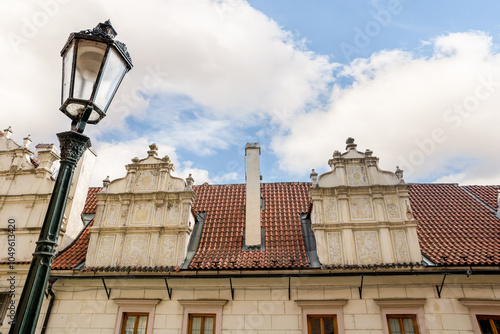 Old building with painted roof on Thunovska Street in the historical part of Prague in Czech Republic photo