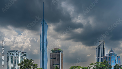 Photography Skyscrapers against a background of blue sky and clouds