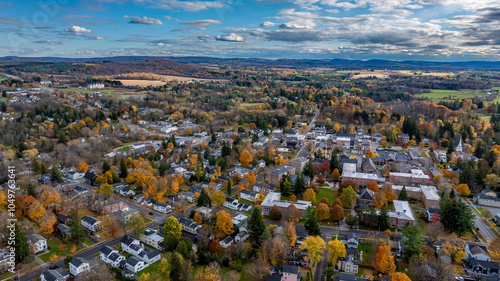 Aerial photo of fall foliage surrounding the Village of Cazenovia, Madison County, New York, October 2024.	 photo