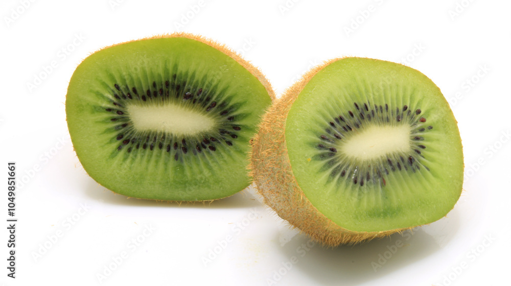 Kiwi half with shadow. Juicy fresh fruit. Summer photo. Side view Kiwi half with shadow. Juicy fresh fruit. Summer photo. Side view