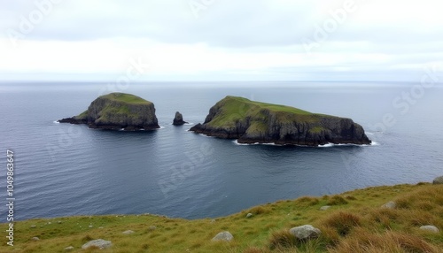  Gentle giants of the sea Two majestic rocks stand tall against the horizon