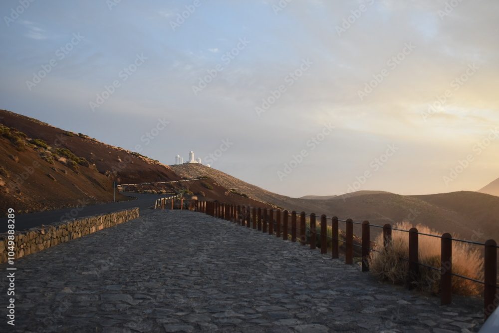 Fototapeta premium Road, sunset and mountains in Tenerife