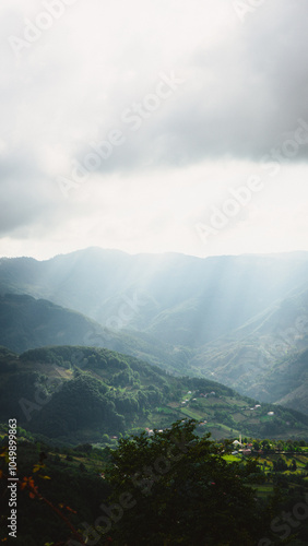 Forested valley under cloudy sky, Erbaa, Tokat, Turkey photo