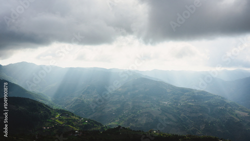 Forested valley under cloudy sky, Erbaa, Tokat, Turkey photo