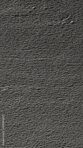 Monochrome textured background with fine horizontal lines and a subtle grainy effect