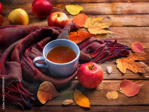 coffee with autumn leaves and apple