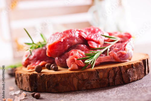 raw beaf on a light table. photo