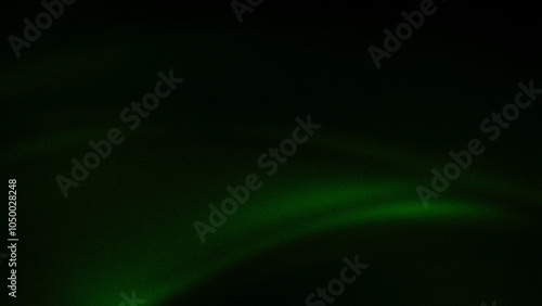 Dark abstract gradient background with deep green hues and a subtle grainy texture, ideal for wallpapers, banners, and modern design projects