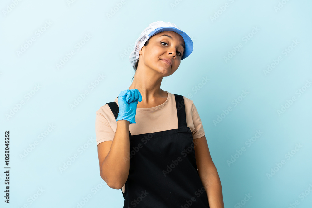 Fishwife asian woman over isolated background proud and self-satisfied Fishwife asian woman over isolated background proud and self-satisfied