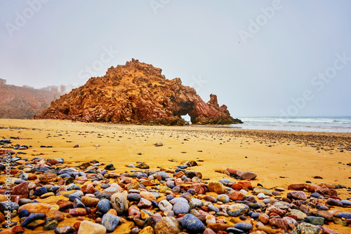 A nice rock at Mirleft beach in Morocco photo