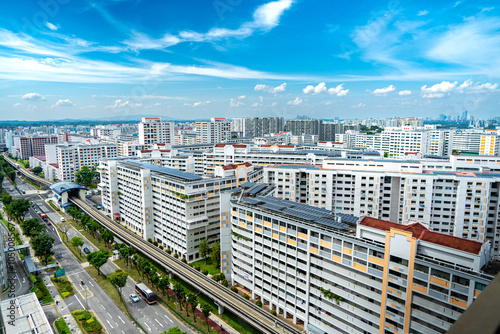 Photography A landscape view of Singapore HDB housing with bright sky and clouds