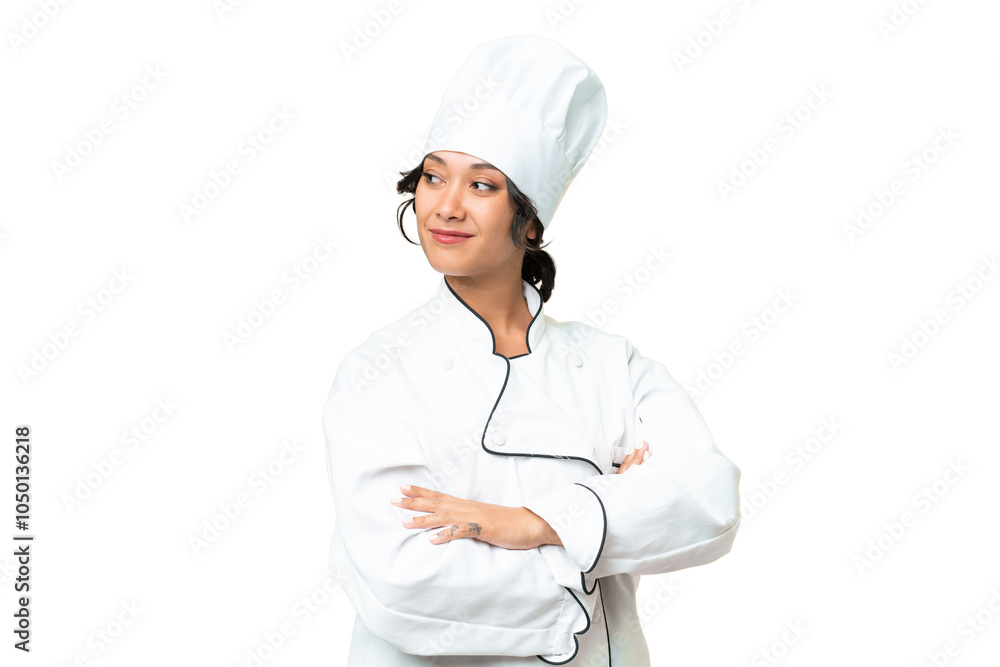 Young chef Argentinian woman over isolated background with arms crossed and happy Young chef Argentinian woman over isolated background with arms crossed and happy