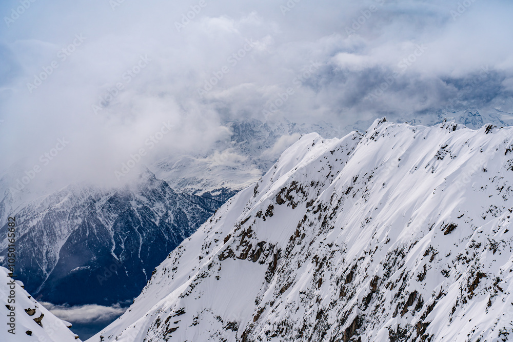 View on winter mpuntains from Eggishorn peak, Alps.
