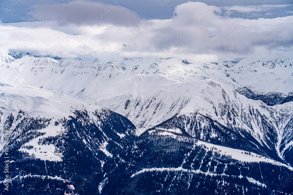 View on winter mpuntains from Eggishorn peak, Alps.