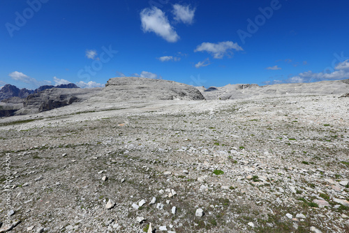 panorama from the top of Sasso Pordoi mountain in the Italian Dolomites with an almost lunar landscape without vegetation at almost 3000 meters o photo