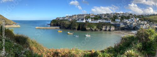Port Isaac  is a small fishing village on the Atlantic coast of north Cornwall, England, in the United Kingdom